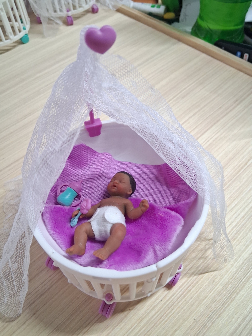Mini Baby Doll Bassinet with Purple Bedding